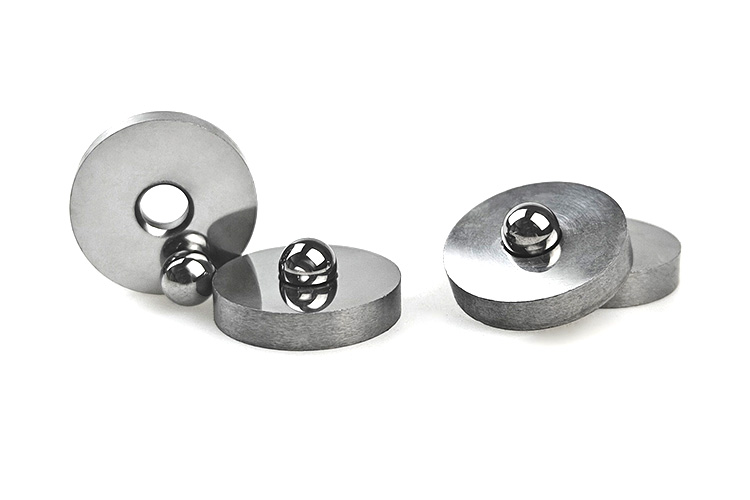 Tungsten carbide valve seats and cores